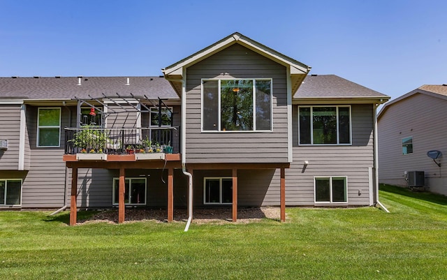 9180 Geanna Ct, West Des Moines, IA 50266 - back of house with a pergola, a yard, a wooden deck, and a shingled roof