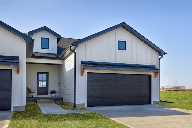 2004 Ammann Dr, Adel, IA 50003 - modern farmhouse featuring board and batten siding, driveway, a front yard, and roof with shingles