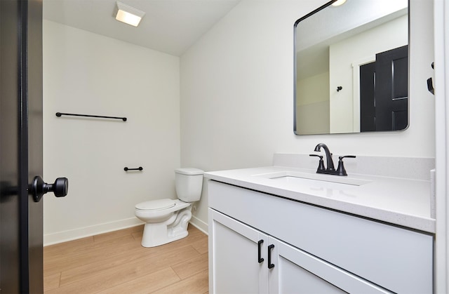2004 Ammann Dr, Adel, IA 50003 - bathroom with vanity and wood finished floors