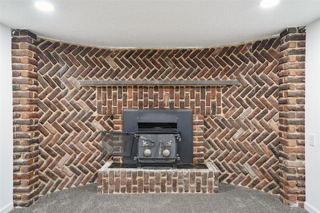 2515 Glenbrook Dr, Des Moines, IA 50316 - detailed view of a wood stove and carpet floors