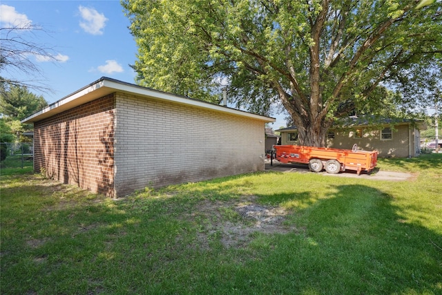 2515 Glenbrook Dr, Des Moines, IA 50316 - view of home's exterior with brick siding and a yard