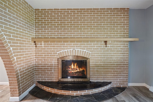 2515 Glenbrook Dr, Des Moines, IA 50316 - detailed view of wood finished floors and a fireplace