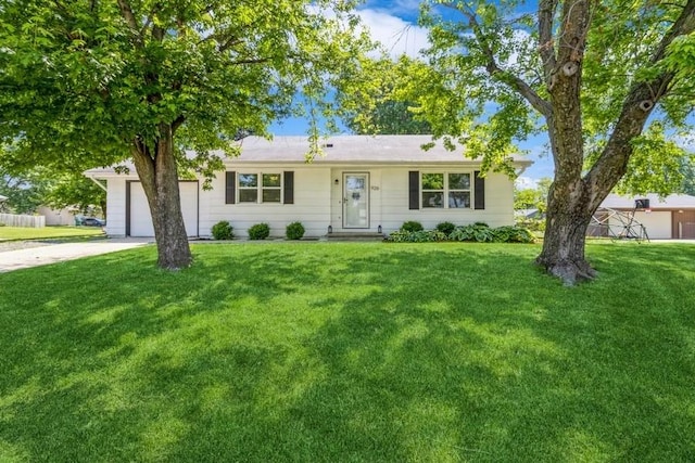 926 Casady Dr, Norwalk, IA 50211 - single story home featuring a front yard, an attached garage, and concrete driveway