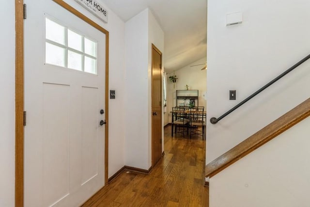 926 Casady Dr, Norwalk, IA 50211 - foyer entrance with wood finished floors, stairway, and a ceiling fan