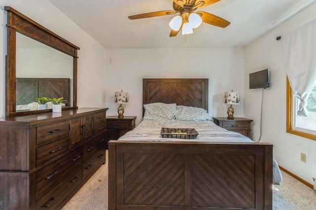 926 Casady Dr, Norwalk, IA 50211 - bedroom with light carpet and ceiling fan