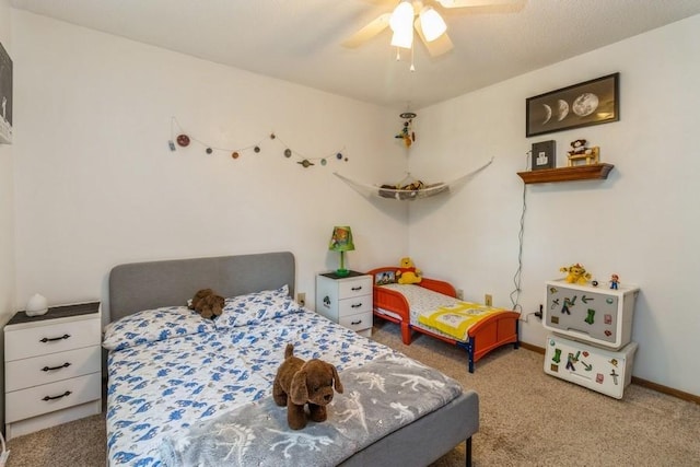 926 Casady Dr, Norwalk, IA 50211 - bedroom with carpet floors and ceiling fan