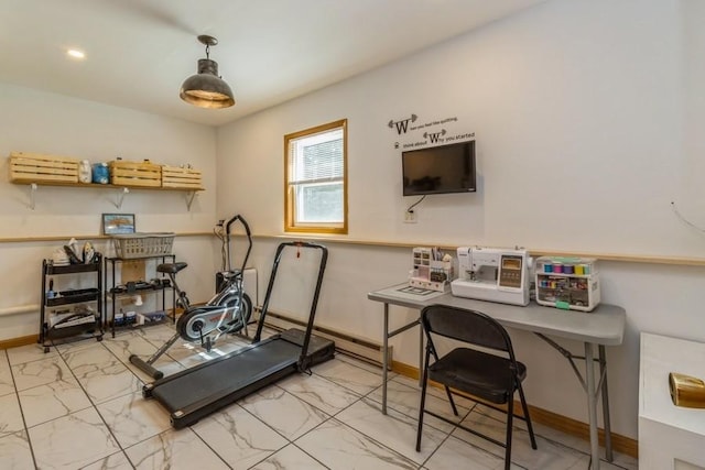 926 Casady Dr, Norwalk, IA 50211 - workout room featuring marble look tiles and baseboards