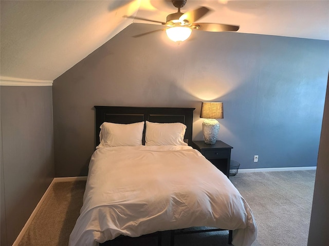 707 E 27th St S, Newton, IA 50208 - carpeted bedroom with lofted ceiling and a ceiling fan