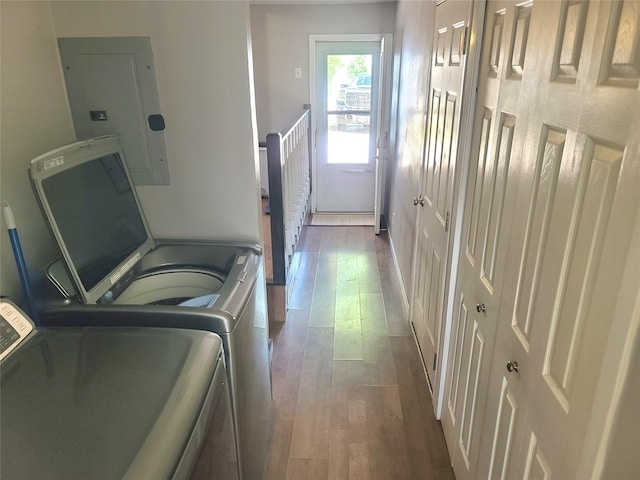 707 E 27th St S, Newton, IA 50208 - washroom featuring electric panel, washing machine and dryer, and dark wood finished floors
