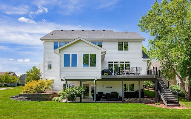 6511 NW 93rd St, Johnston, IA 50131 - back of house featuring stairs, a patio, a yard, a wooden deck, and an outdoor living space