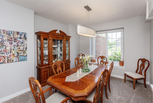 6511 NW 93rd St, Johnston, IA 50131 - dining area with baseboards and carpet flooring