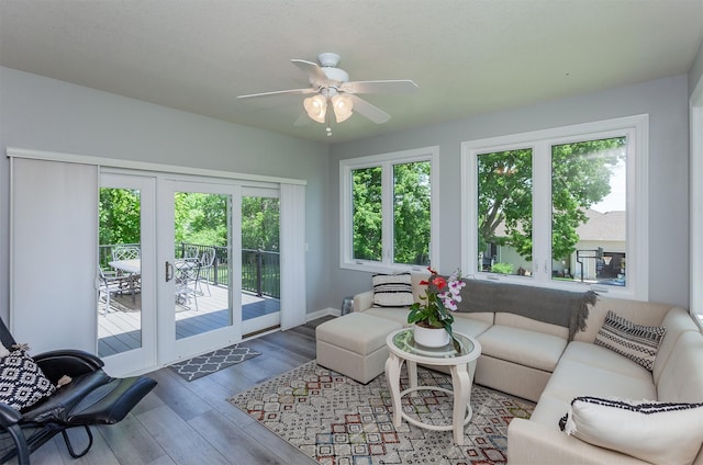 6511 NW 93rd St, Johnston, IA 50131 - living area featuring wood finished floors and ceiling fan