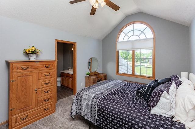 6511 NW 93rd St, Johnston, IA 50131 - carpeted bedroom featuring lofted ceiling, ensuite bathroom, and ceiling fan