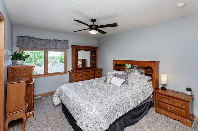 6511 NW 93rd St, Johnston, IA 50131 - carpeted bedroom featuring baseboards and ceiling fan