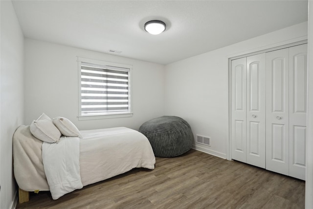 2814 Long Ave, Van Meter, IA 50261 - bedroom with wood finished floors and a closet