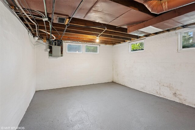 3320 SW 12th St, Des Moines, IA 50315 - basement featuring healthy amount of natural light and electric panel