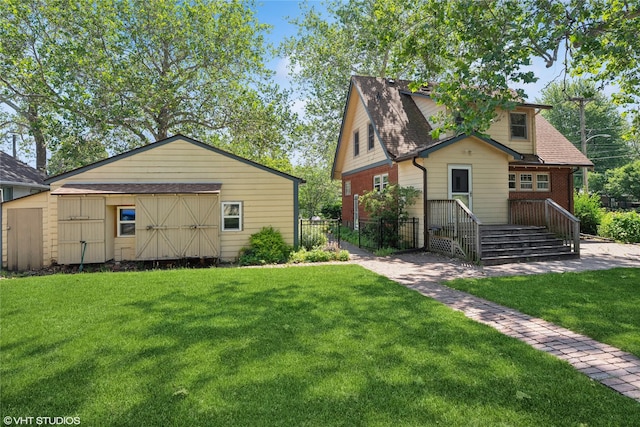 3320 SW 12th St, Des Moines, IA 50315 - view of front of property featuring an outdoor structure and roof with shingles