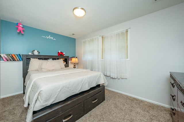 4012 79th St, Urbandale, IA 50322 - carpeted bedroom featuring baseboards