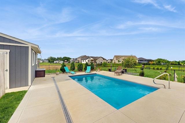 469 SE Hollow Ct, West Des Moines, IA 50265 - view of swimming pool featuring a patio and a residential view