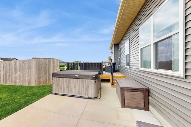 469 SE Hollow Ct, West Des Moines, IA 50265 - view of patio / terrace featuring a hot tub
