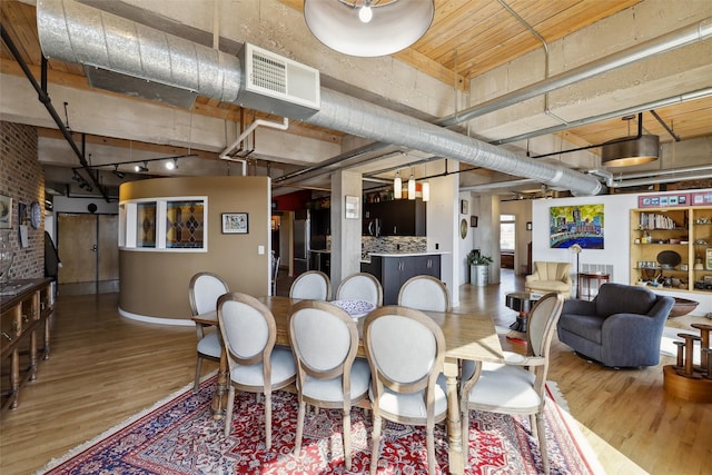 100 Market St Unit 409, Des Moines, IA 50309 - dining space with wood finished floors and baseboards