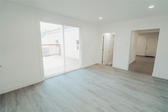 3405 30th St, Des Moines, IA 50310 - spare room featuring wood finished floors and recessed lighting