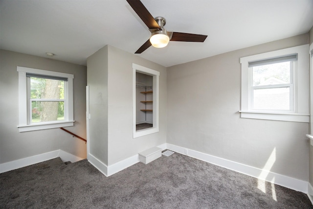 1012 28th St, Des Moines, IA 50311 - spare room featuring carpet flooring and a ceiling fan