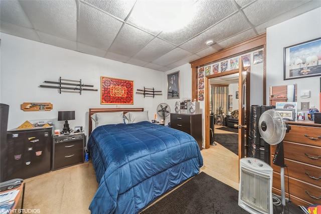 1418 E 9th St, Des Moines, IA 50316 - carpeted bedroom with a paneled ceiling