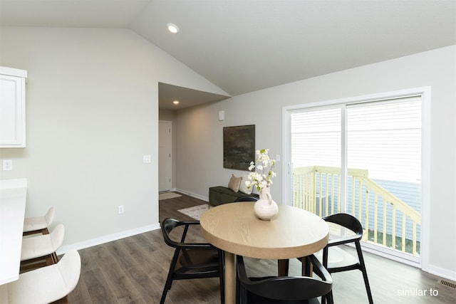 735 Linden St, Carlisle, IA 50047 - dining space featuring lofted ceiling, dark wood-style flooring, and recessed lighting