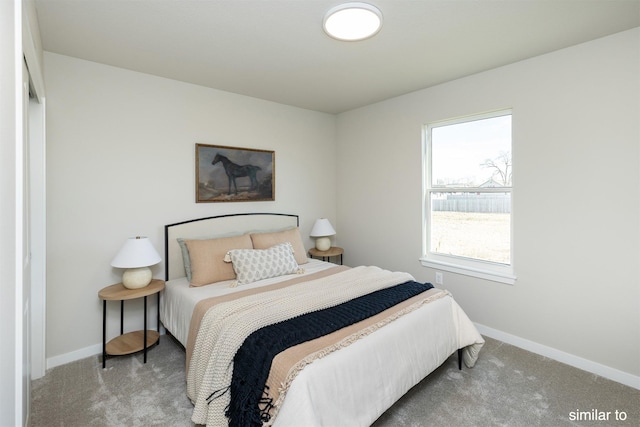 735 Linden St, Carlisle, IA 50047 - carpeted bedroom featuring baseboards