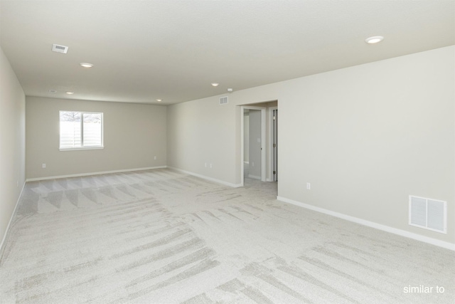 735 Linden St, Carlisle, IA 50047 - unfurnished room with light colored carpet and recessed lighting