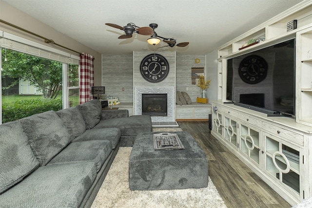 1205 Lancaster Way, Indianola, IA 50125 - living area with ceiling fan, wood finished floors, and a fireplace
