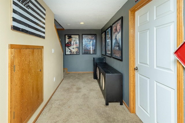 1205 Lancaster Way, Indianola, IA 50125 - hall featuring light carpet and baseboards