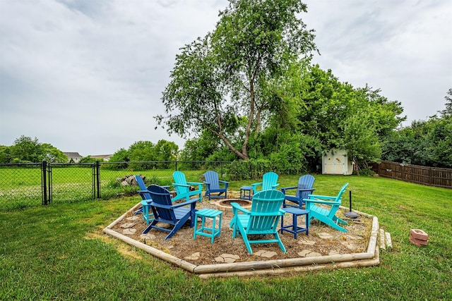 1205 Lancaster Way, Indianola, IA 50125 - fenced backyard with a storage shed and an outdoor fire pit