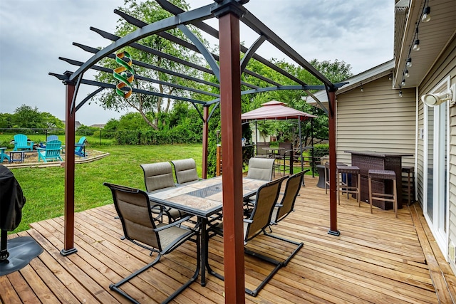 1205 Lancaster Way, Indianola, IA 50125 - wooden terrace with outdoor dining area and a gazebo