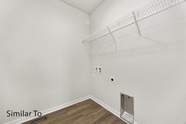 16732 Walnut Meadows Cir, Urbandale, IA 50323 - laundry area featuring hookup for a washing machine, dark wood-style flooring, electric dryer hookup, and heating unit