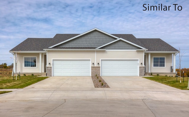 16732 Walnut Meadows Cir, Urbandale, IA 50323 - craftsman house with driveway, an attached garage, roof with shingles, and a front lawn