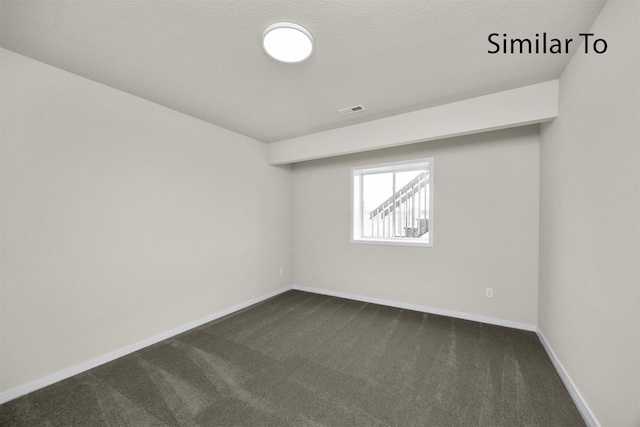 16738 Walnut Meadows Cir, Urbandale, IA 50323 - empty room with dark carpet and baseboards
