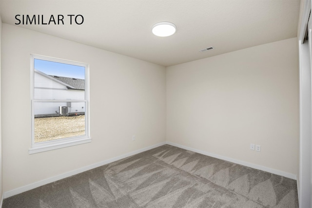 2212 Legacy Dr, Norwalk, IA 50211 - carpeted empty room featuring baseboards
