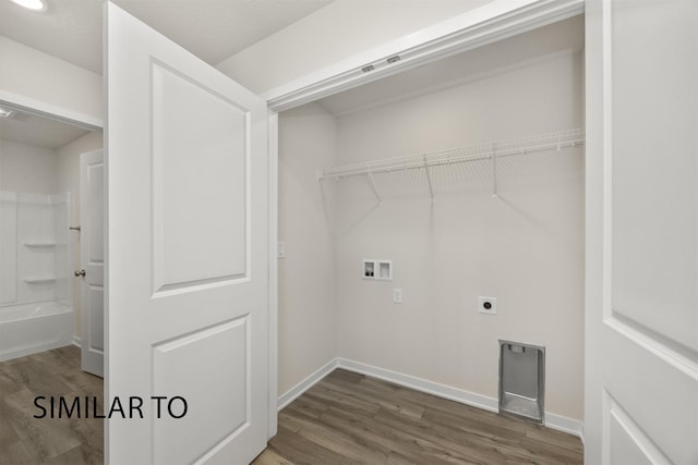 2212 Legacy Dr, Norwalk, IA 50211 - laundry room featuring hookup for a washing machine, wood finished floors, and hookup for an electric dryer