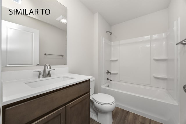 2212 Legacy Dr, Norwalk, IA 50211 - full bath featuring wood finished floors, vanity, and bathing tub / shower combination