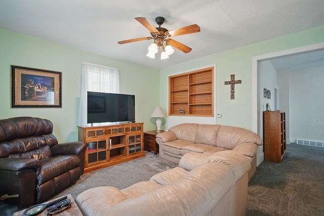 604 W 2nd Ave, Indianola, IA 50125 - living area featuring carpet and ceiling fan
