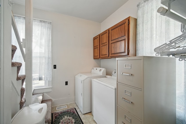 604 W 2nd Ave, Indianola, IA 50125 - laundry room featuring cabinet space and washing machine and dryer