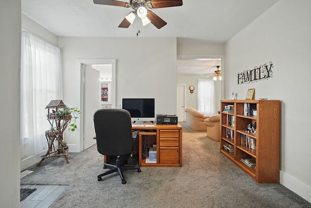 604 W 2nd Ave, Indianola, IA 50125 - home office featuring a ceiling fan and carpet flooring