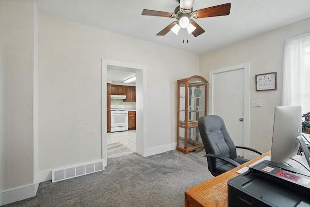 604 W 2nd Ave, Indianola, IA 50125 - office featuring a ceiling fan and carpet