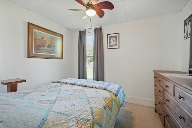 604 W 2nd Ave, Indianola, IA 50125 - bedroom with light carpet and a ceiling fan