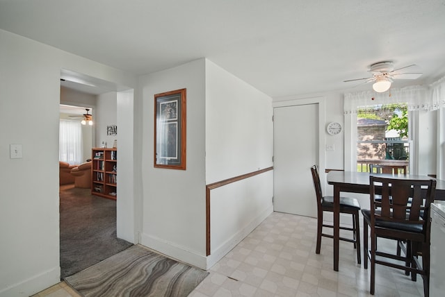 604 W 2nd Ave, Indianola, IA 50125 - dining space featuring ceiling fan, healthy amount of natural light, and light floors