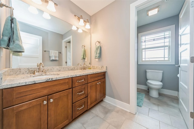 16823 Prairie Dr, Clive, IA 50325 - bathroom with double vanity and tile patterned floors