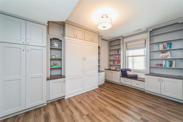 16823 Prairie Dr, Clive, IA 50325 - office featuring wood finished floors and a textured ceiling