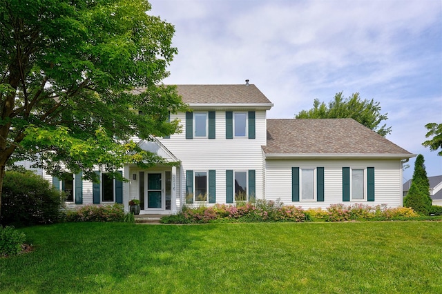 2216 NW 136th St, Clive, IA 50325 - colonial-style house with a front lawn and a shingled roof
